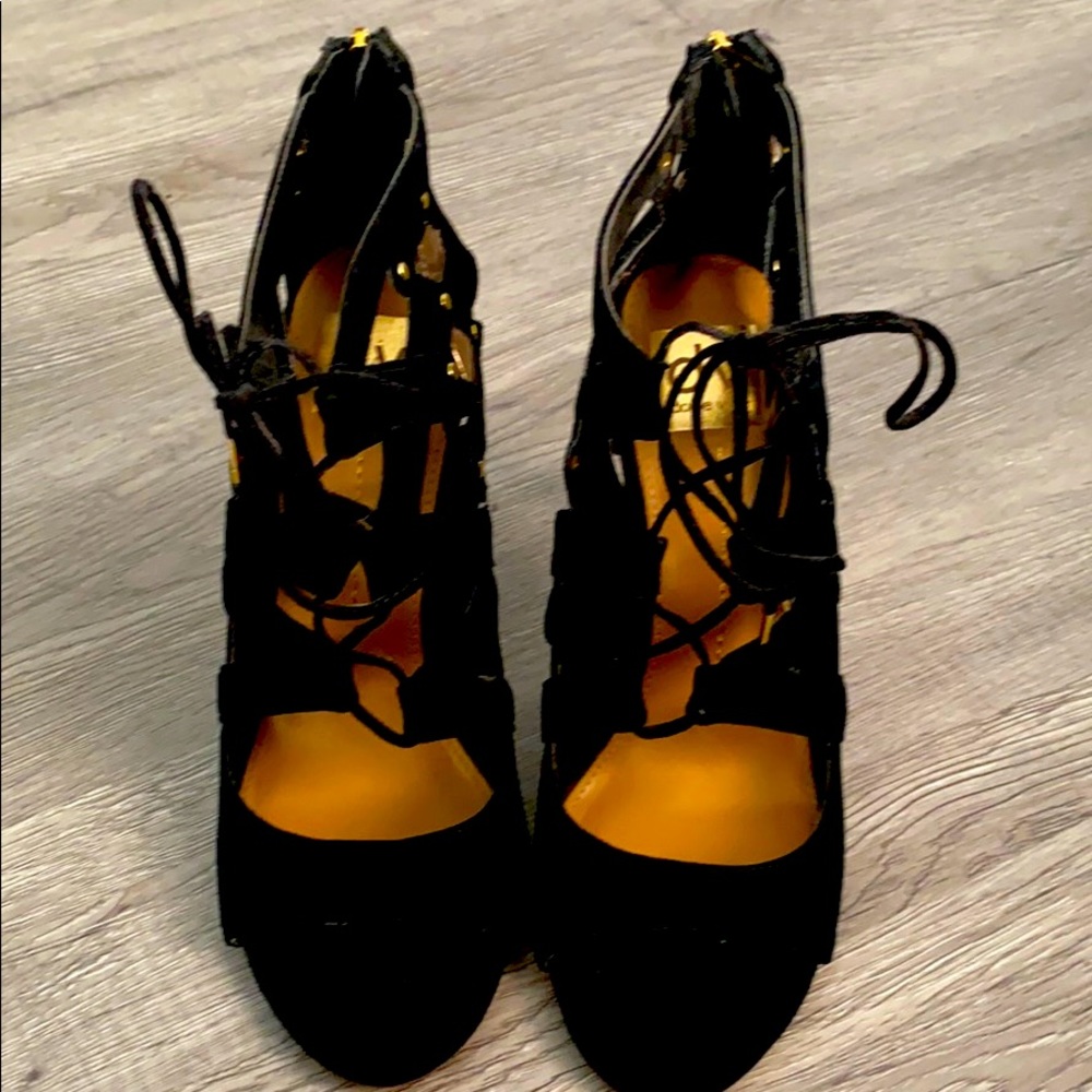 Black and gold heels